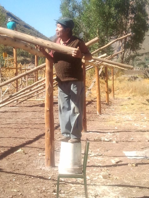 The local team chopped down trees and hewed them into beams for the greenhouse!